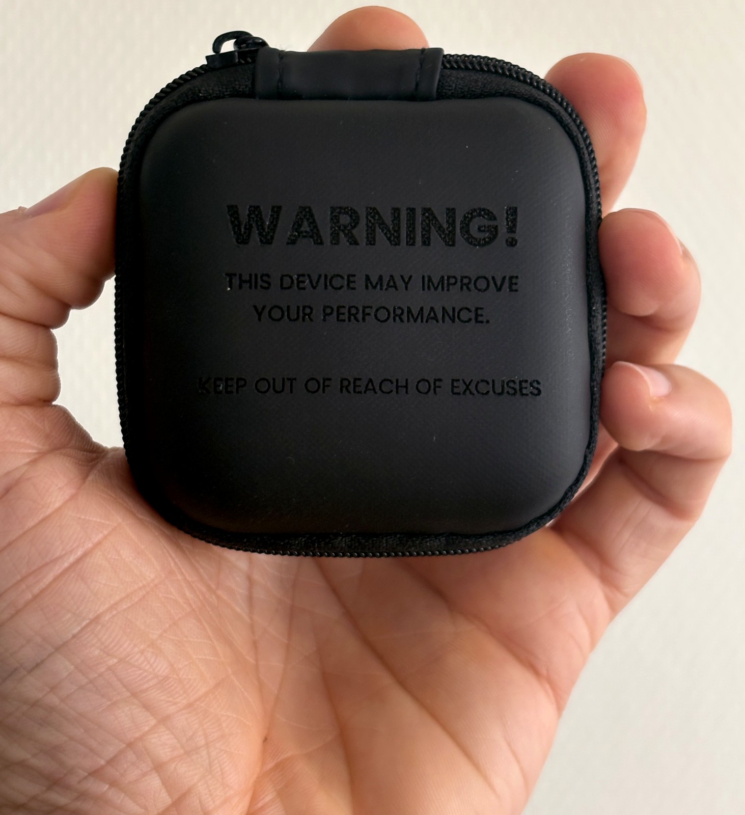 ODKI‑VBT case, back, with embossed text